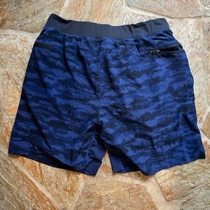Fabletics, athletic short with built-in liner with cell phone pocket holder.